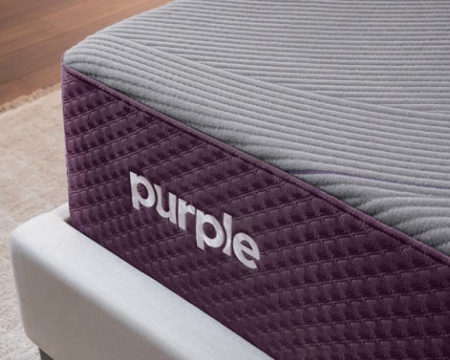 Close up corner of the Purple Hybrid Restore mattress.