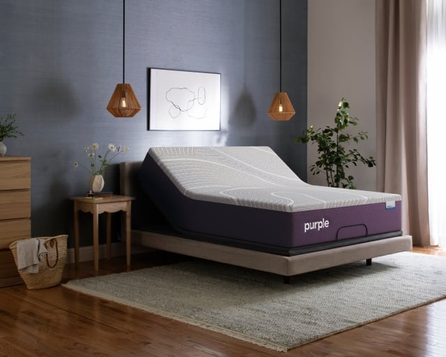 A Purple RestorePlus Hybrid mattress on an adjustable base.