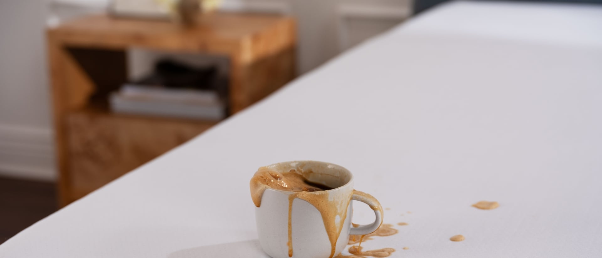 Coffee spilling on a mattress
