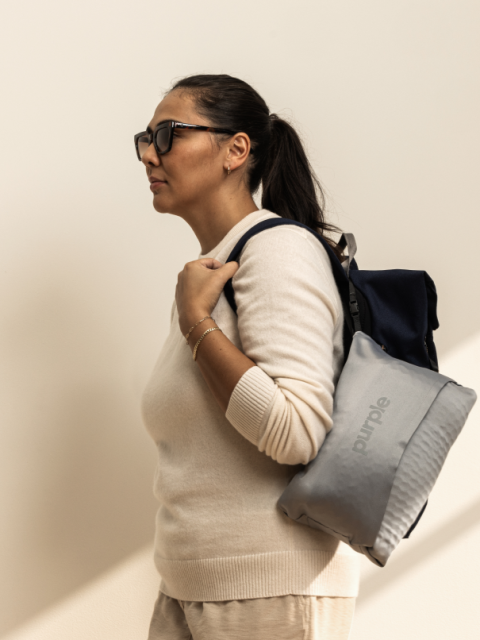 Harmony anywhere pillow in travel case clipped on backpack